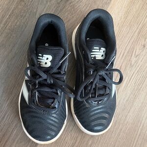 New Balance Kids Black and White baseball cleats